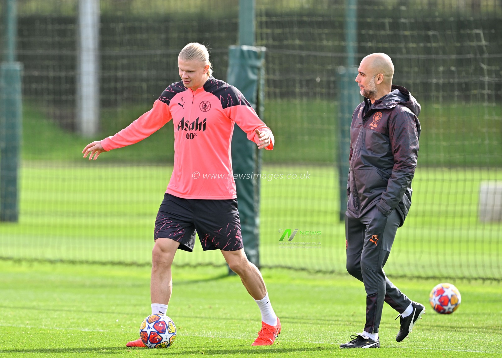 Erling Haaland of Manchester City speaks with Pep Guardiola manager of Manchester City during the Manchester City champions League training session ahead of the Real Madrid game at Etihad Stadium, Manchester, United Kingdom, 8th April 2024

(Photo by Cody Froggatt/News Images)