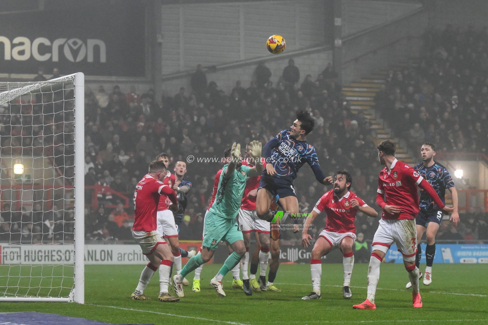 Kyle Joseph of Blackpool heads on goal during the Sky Bet League 1 match Wrexham vs Blackpool at SToK Cae Ras, Wrexham, United Kingdom, 26th December 2024

(Photo by Craig Thomas/News Images)