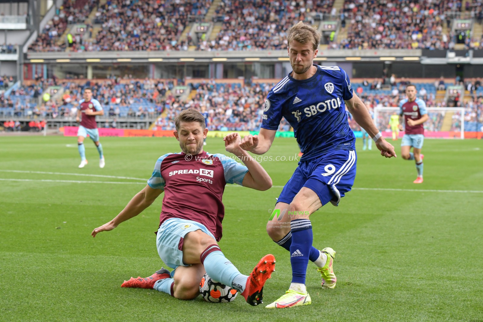 James Tarkowski #5 of Burnley blocks a shot from Patrick Bamford #9 of Leeds United
