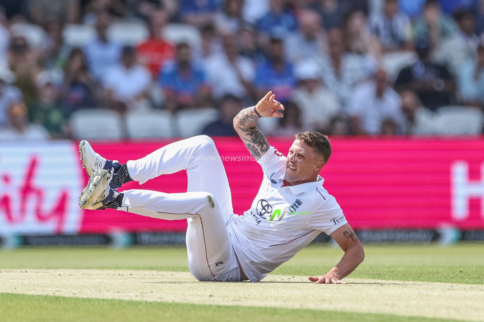 Brydon Carse of England falls over after delivering the ball during the 1st Rothesay Test Match Day 2 England vs India at Headingley Cricket Ground, Leeds, United Kingdom, 21st June 2025

(Photo by Mark Cosgrove/News Images)