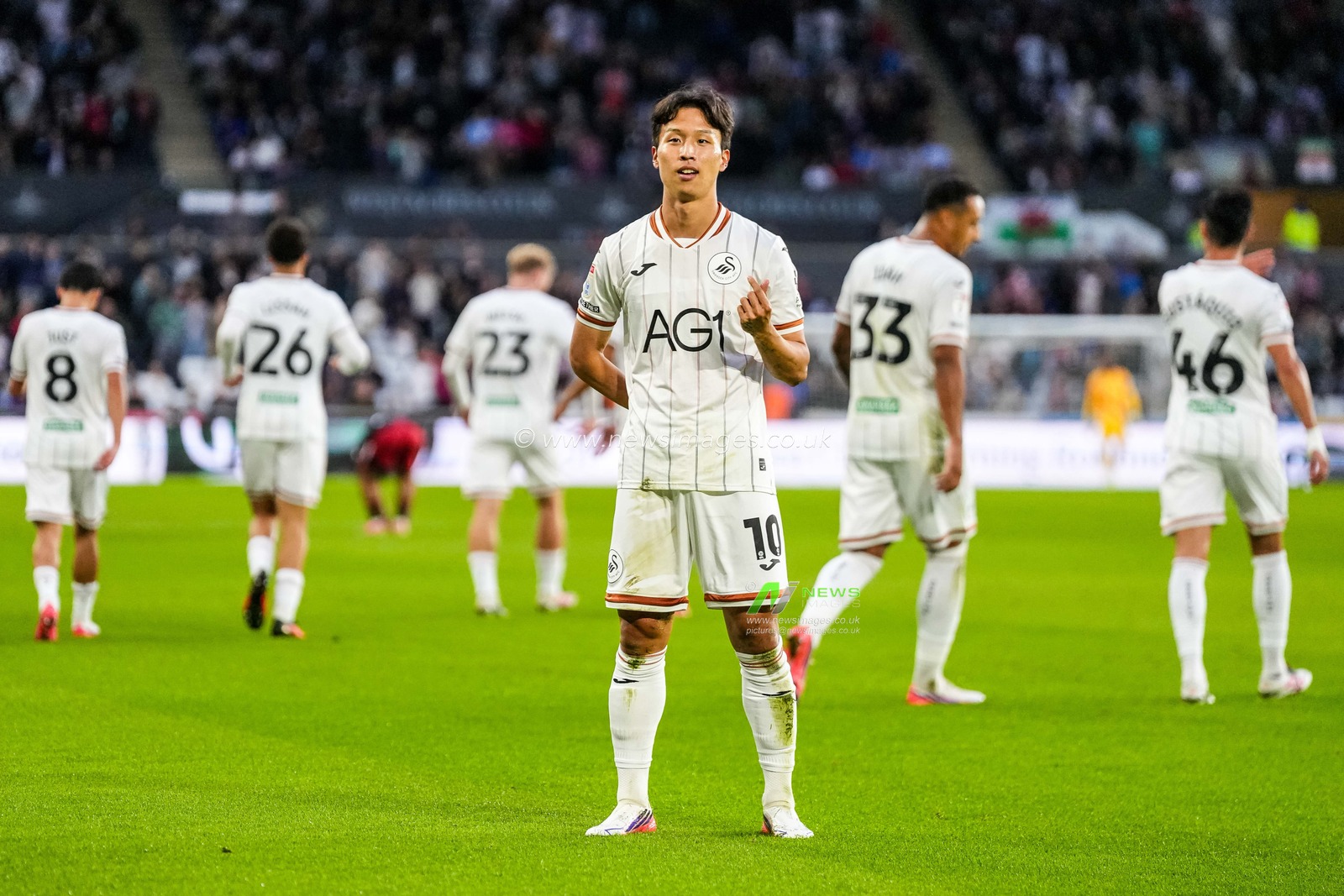 Eom Ji-Sung of Swansea City celebrates scoring his teams first goal during the Sky Bet Championship match Swansea City vs Watford at Swansea.com Stadium, Swansea, United Kingdom on 01 September 2026

(Photo by Andrew Lewis/News Images)