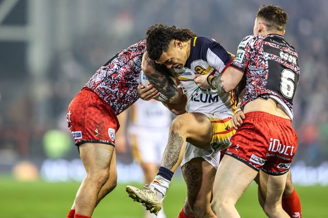 Charlie Staines of Catalans Dragons is tackled by Liam Horne of Leigh Leopards and Adam Cook of Leigh Leopards during the Betfred Super League match Leigh Leopards vs Catalans Dragons at Leigh Sports Village, Leigh, United Kingdom on 06 March 2026

(Photo by Alfie Cosgrove/News Images)