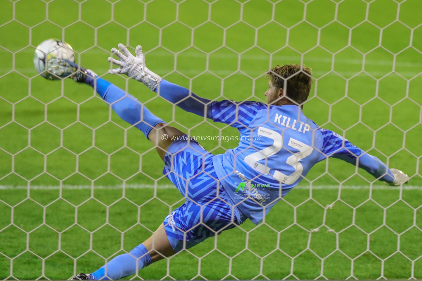Ben Killip #23 of Barnsley saves a penalty from Regan Hendry of Tranmere Rovers in the penalty shootout during the Carabao Cup match Barnsley vs Tranmere Rovers at Oakwell, Barnsley, United Kingdom, 8th August 2023

(Photo by Alfie Cosgrove/News Images)