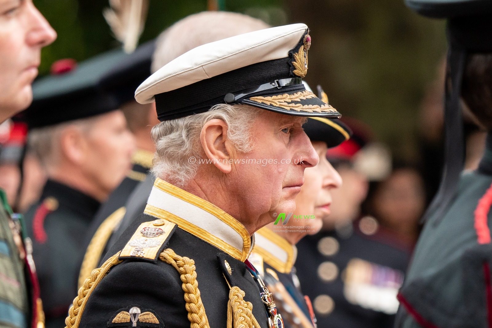 King Charles 111 glances to the right during the procession of the coffin of Queen Elizabeth 11 towards Buckingham Palace in the Mall London City Centre, London, United Kingdom, 19th September 2022

(Photo by Richard Washbrooke/News Images)