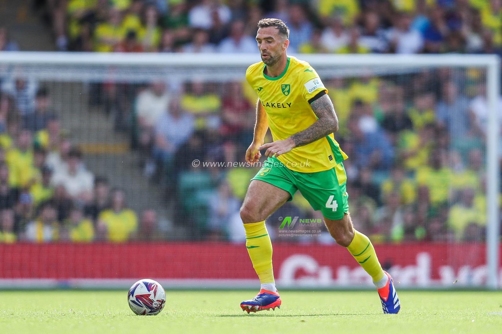Shane Duffy of Norwich City runs with the ball during the Sky Bet Championship match Norwich City vs Blackburn Rovers at Carrow Road, Norwich, United Kingdom, 17th August 2024

(Photo by Izzy Poles/News Images)