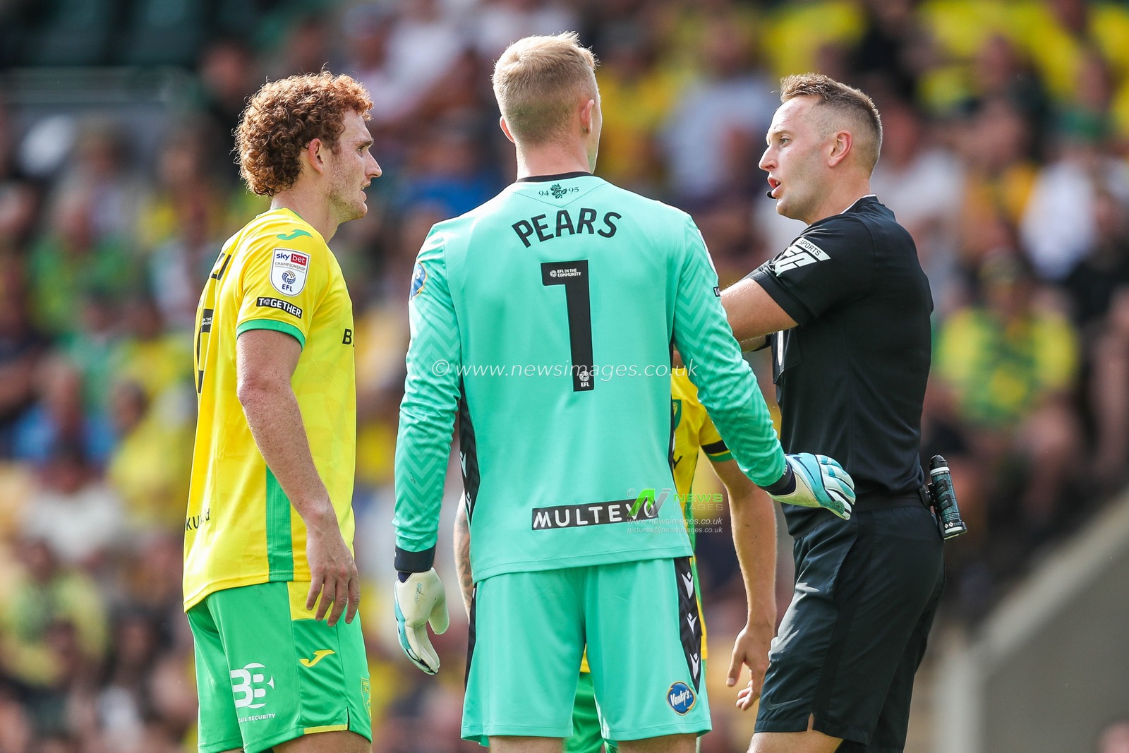 Josh Sargent of Norwich City and Aynsley Pears of Blackburn Rovers react during the Sky Bet Championship match Norwich City vs Blackburn Rovers at Carrow Road, Norwich, United Kingdom, 17th August 2024

(Photo by Izzy Poles/News Images)