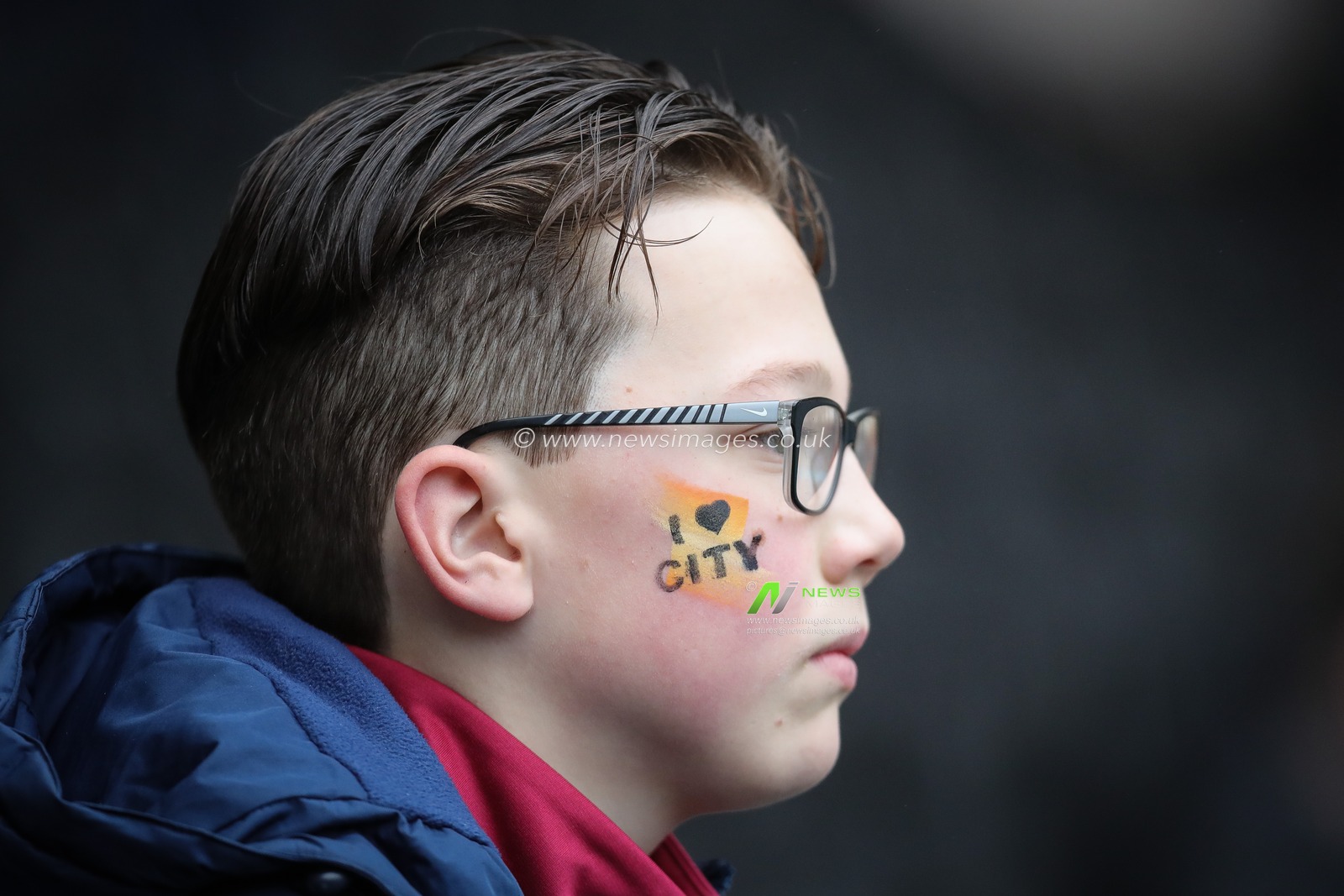 A Hull City supporter with â€˜I Love Cityâ€™ face paints on watches his team during the Sky Bet Championship match Hull City vs Rotherham United at MKM Stadium, Hull, United Kingdom, 1st April 2023

(Photo by James Heaton/News Images)