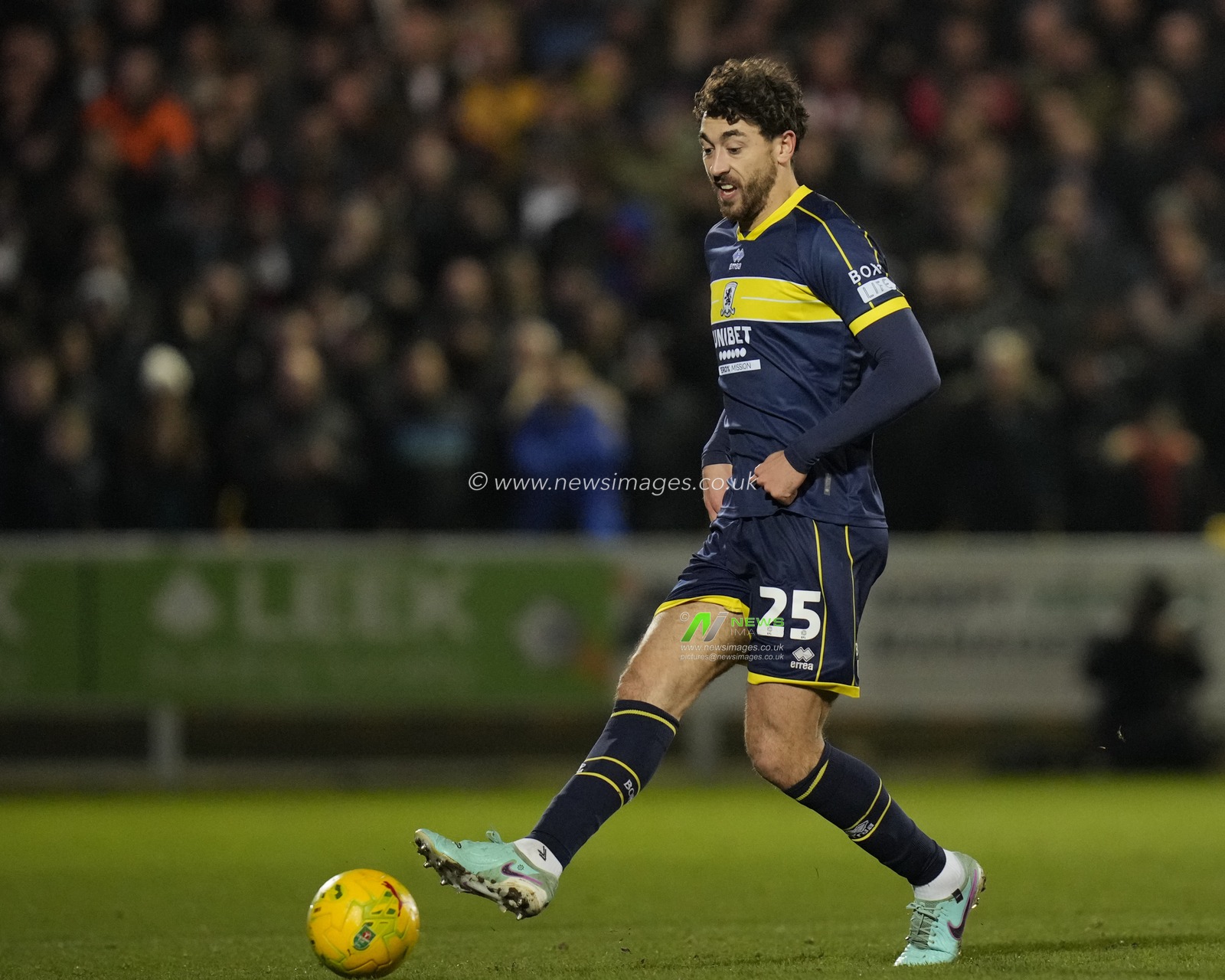 Matt Crooks #25 of Middlesbrough passes the ball during the Carabao Cup Quarter Final match Port Vale vs Middlesbrough at Vale Park, Burslem, United Kingdom, 19th December 2023

(Photo by Steve Flynn/News Images)