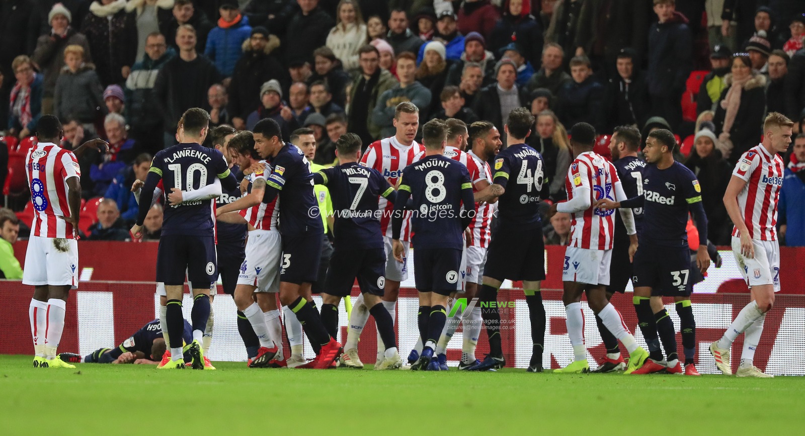 28th November 2018, Bet365 Stadium, Stoke-on-Trent, England; Sky Bet Championship, Stoke City v Derby County ; a melee of players scuffle after Oghenekaro Etebo of Stoke City commits a bad foul and is sent off

Credit: Conor Molloy/News Images

English Football League images are subject to DataCo Licence