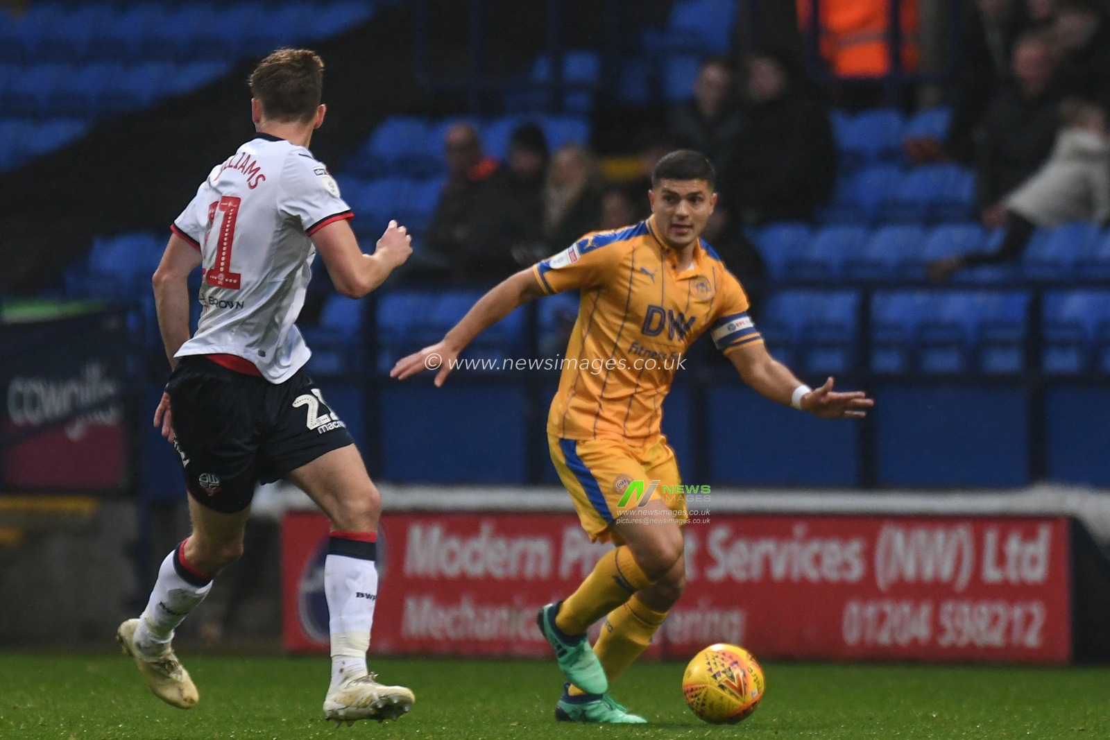 1st December 2018, University of Bolton Stadium, Bolton, England; Sky Bet Championship, Bolton v Wigan ; Sam Morsy of Wigan Athletic finds a way past Will Buckley of Bolton Wanderers 


Credit: Richard Long/News Images

English Football League images are subject to DataCo Licence