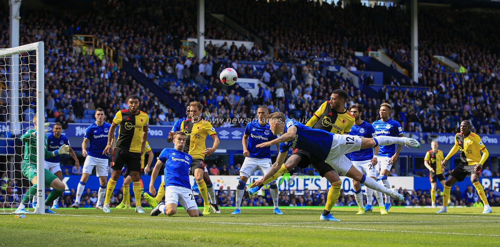 17th August 2019, Goodison Park, Liverpool, England ; Premier League Football, Everton vs Watford : Lucas Digne (12) of Everton makes a defensive header to clear the danger

Credit: Conor Molloy/News Images

English Football League images are subject to DataCo Licence