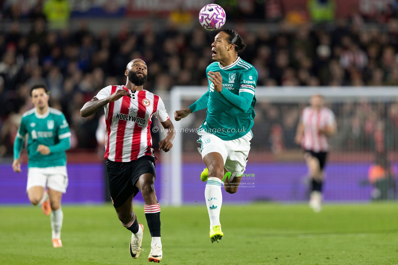 Virgil van Dijk of Liverpool heads the ball away from danger during the Premier League match Brentford vs Liverpool at The Gtech Community Stadium, London, United Kingdom, 25th October 2025

(Photo by Ian Stephen/News Images)