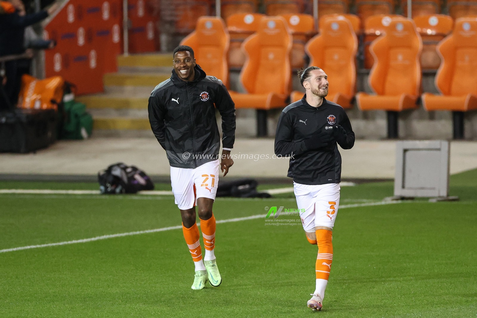 Marvin Ekpiteta #21 of Blackpool and James Husband #3 of Blackpool during the pre-game warmup