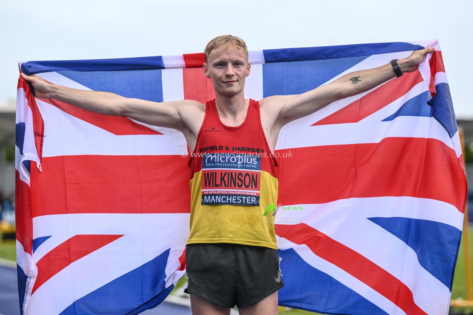 Callum Wilkinson celebrates winning the 10000m with a new national record during the Microplus UK Athletics Championships Day 2 at Manchester Regional Arena, Manchester, United Kingdom, 30th June 2024

(Photo by Craig Thomas/News Images)