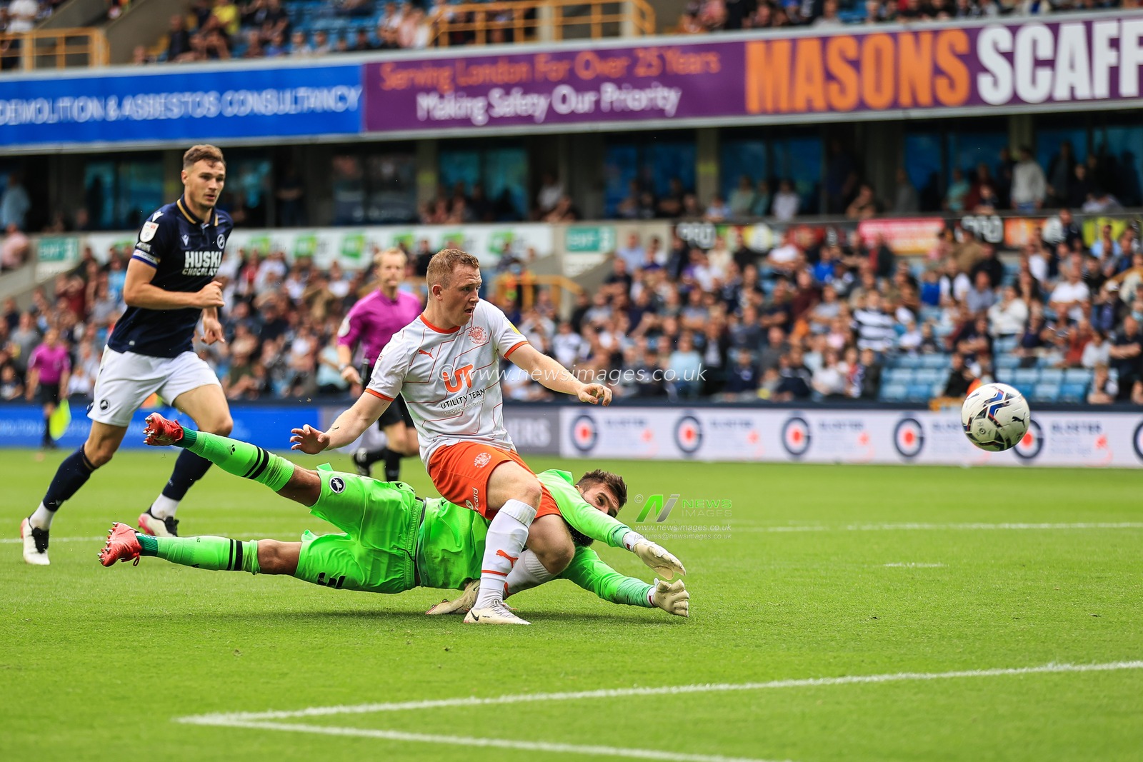 Shayne Lavery #19 of Blackpool scores to make it 0-1