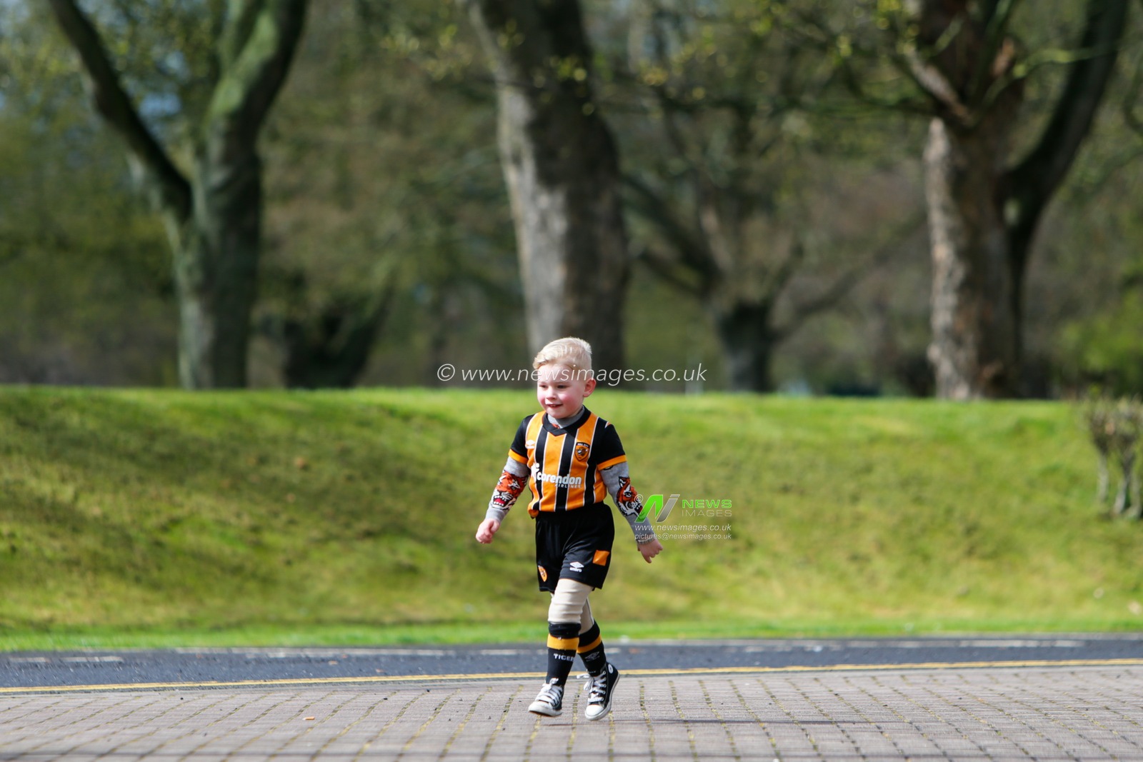 A fan of Hull City arrives for the Sky Bet Championship match Hull City vs Millwall at MKM Stadium, Hull, United Kingdom, 10th April 2023

(Photo by Ben Early/News Images)