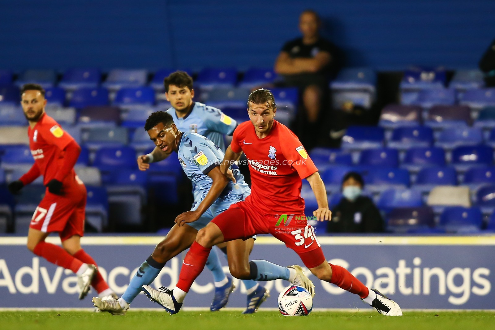 Ivan Sunjic #34 of Birmingham City protects the ball from Sam McCallum #21 of Coventry City
