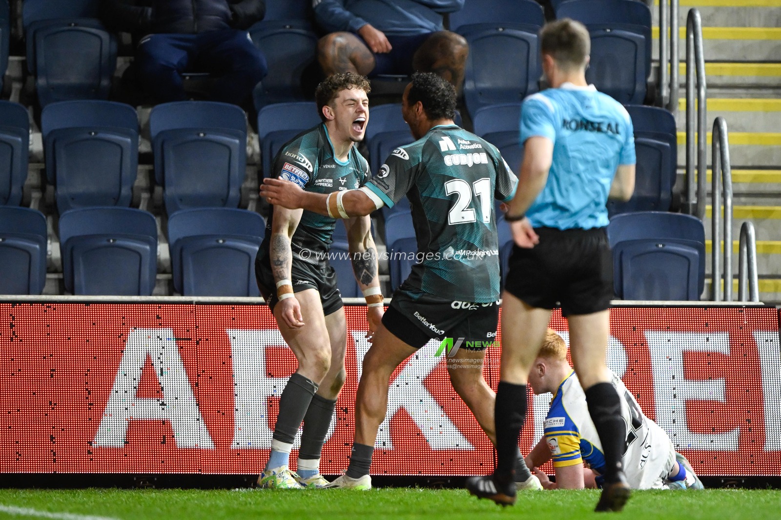 Elliot Wallis of Huddersfield Giants celebrates scoring with Leroy Cudjoe of Huddersfield Giants during the Betfred Super League Round 8 match Leeds Rhinos vs Huddersfield Giants at Headingley Stadium, Leeds, United Kingdom, 19th April 2024

(Photo by Craig Cresswell/News Images)