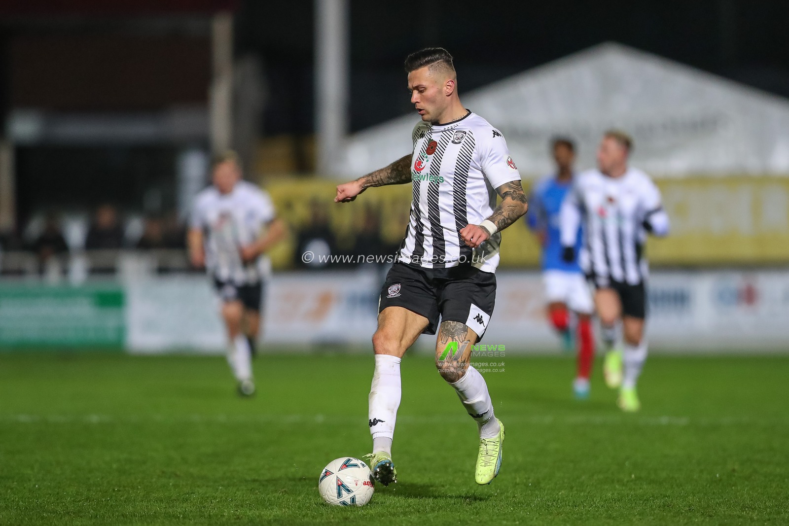 Miles Storey #11 of Hereford runs with the ball during the Emirates FA Cup First Round match Hereford FC vs Portsmouth at Edgar Street, Hereford, United Kingdom, 4th November 2022

(Photo by Gareth Evans/News Images)