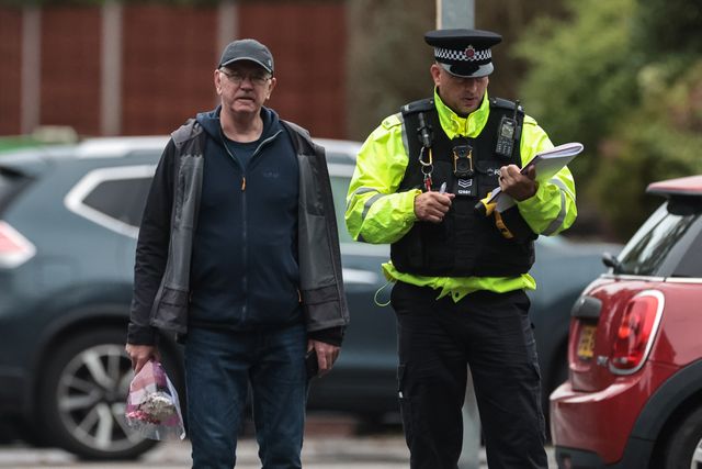 Flowers are brought to the scene as people pay their respects during the Manchester synagogue terror attack day 2 at Heaton Park Shul, Manchester, United Kingdom, 3rd October 2025

(Photo by Mark Cosgrove/News Images)