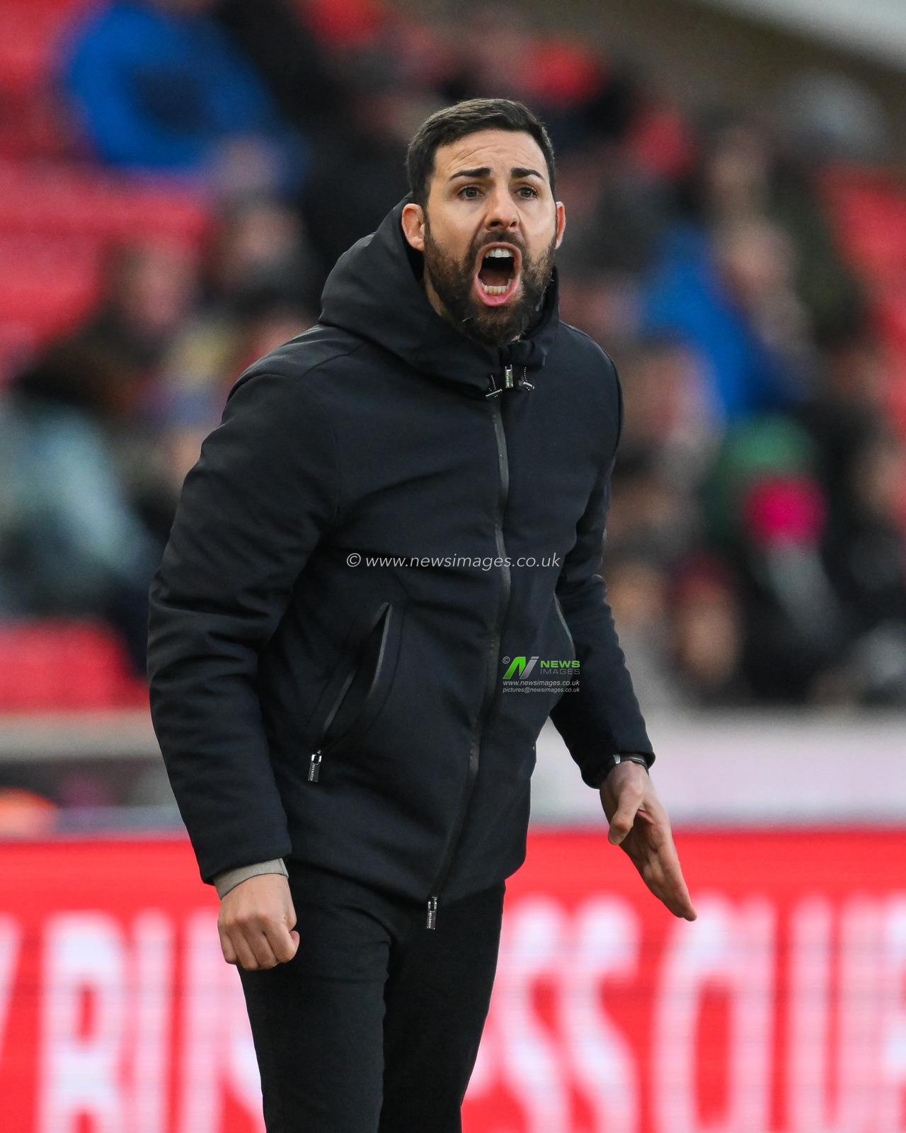 NarcÃ­s Pelach Manager of Stoke City gives his team instructions during the Sky Bet Championship match Stoke City vs Cardiff City at Bet365 Stadium, Stoke-on-Trent, United Kingdom, 14th December 2024

(Photo by Craig Thomas/News Images)