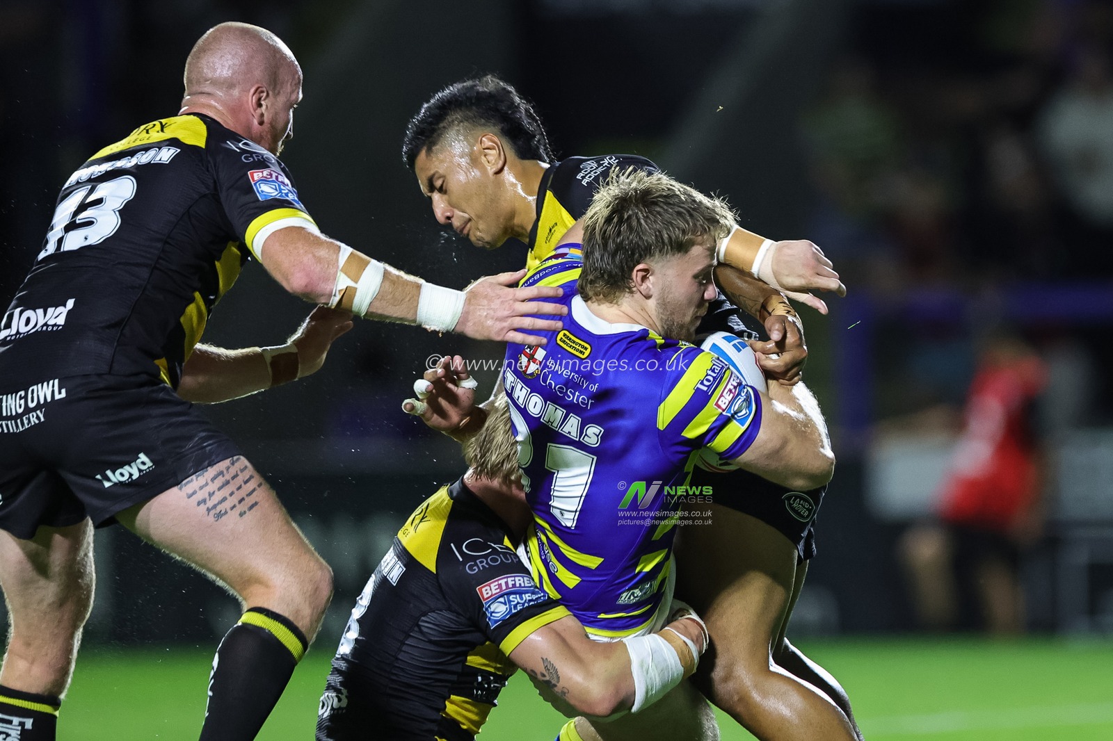 Luke Thomas of Warrington Wolves is tackled by Matty Foster of York Knights during the Betfred Super League round 23 match Warrington Wolves vs York Knights at The Halliwell Jones Stadium, Warrington, United Kingdom on 13 August 2026

(Photo by Mark Cosgrove/News Images)