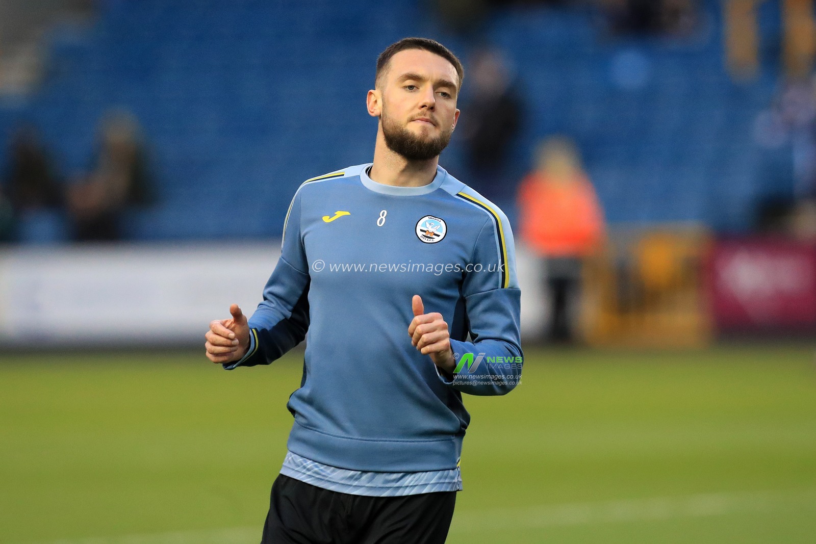Matt Grimes #8 of Swansea City warming up.