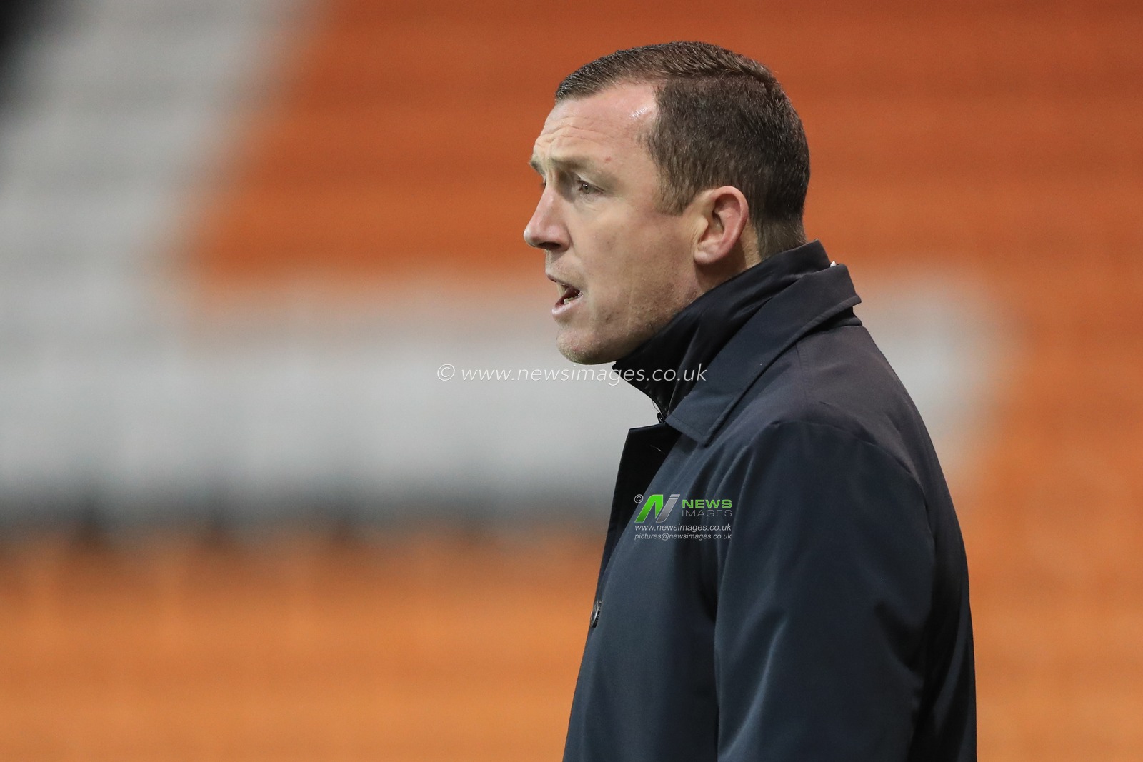 Neill Collins Head coach of Barnsley gives his team instructions during the Bristol Street Motors Trophy match Blackpool vs Barnsley at Bloomfield Road, Blackpool, United Kingdom, 5th December 2023

(Photo by Alfie Cosgrove/News Images)