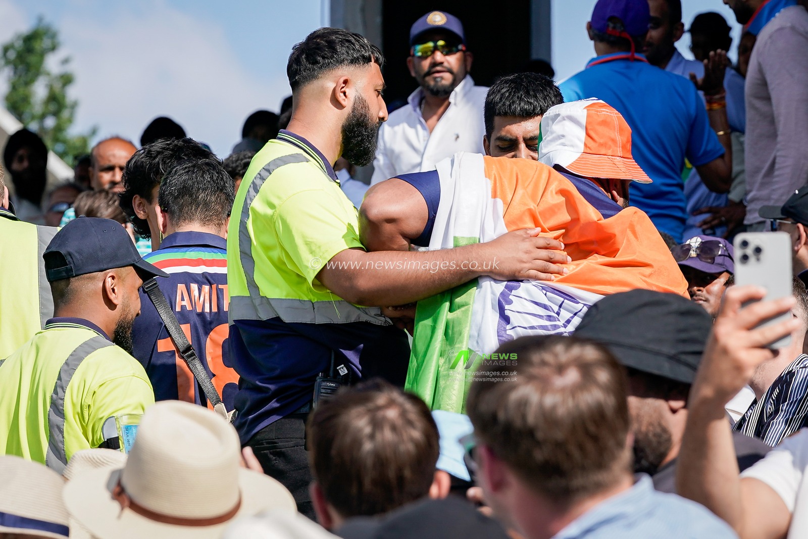 A fan is ejected from the stadium during the 1st Metro Bank ODI match England vs India at Edgbaston, Birmingham, United Kingdom on 14 July 2026

(Photo by Maynard Manyowa/News Images)