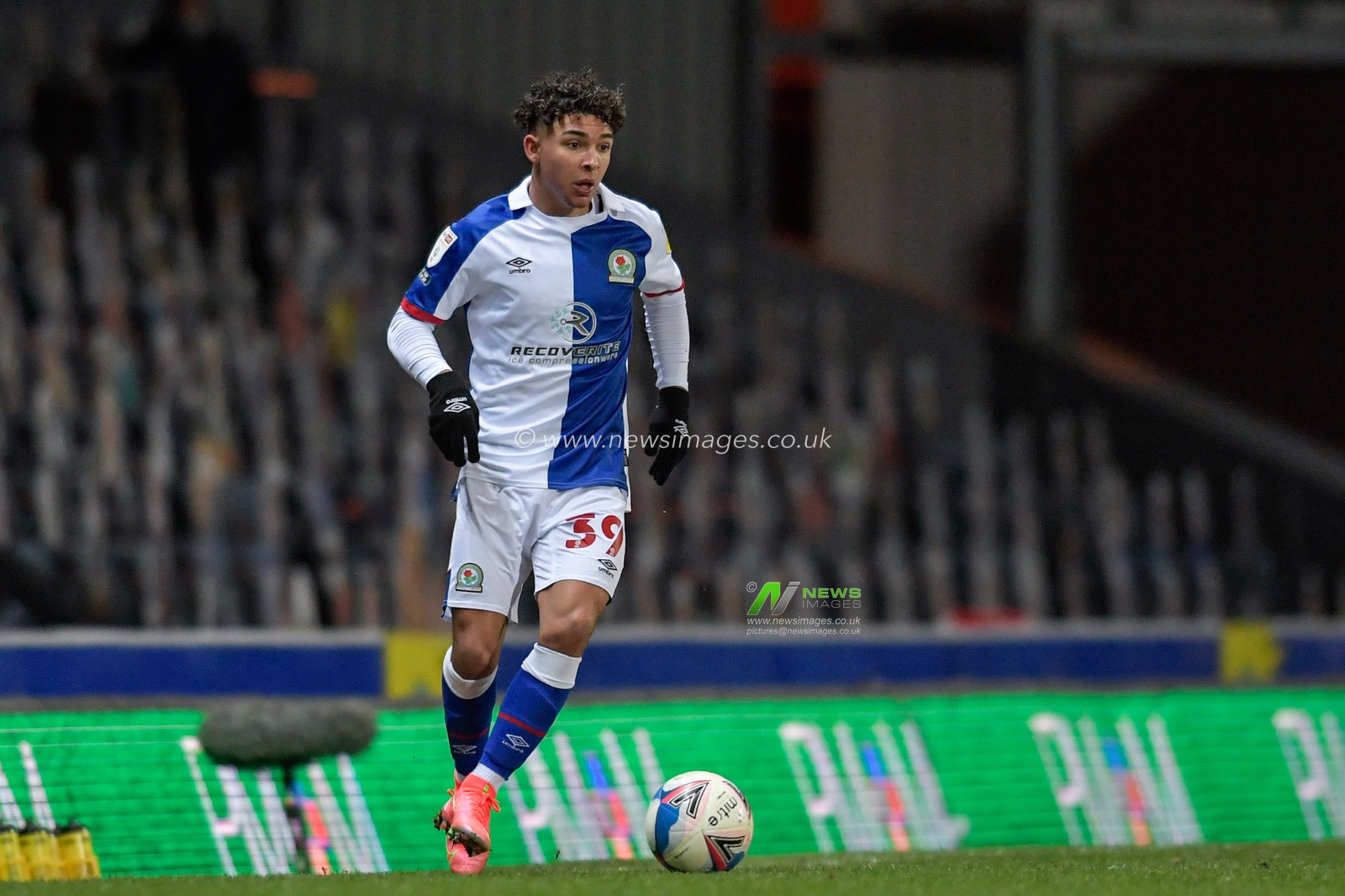 Tyrhys Dolan #39 of Blackburn Rovers runs with the ball