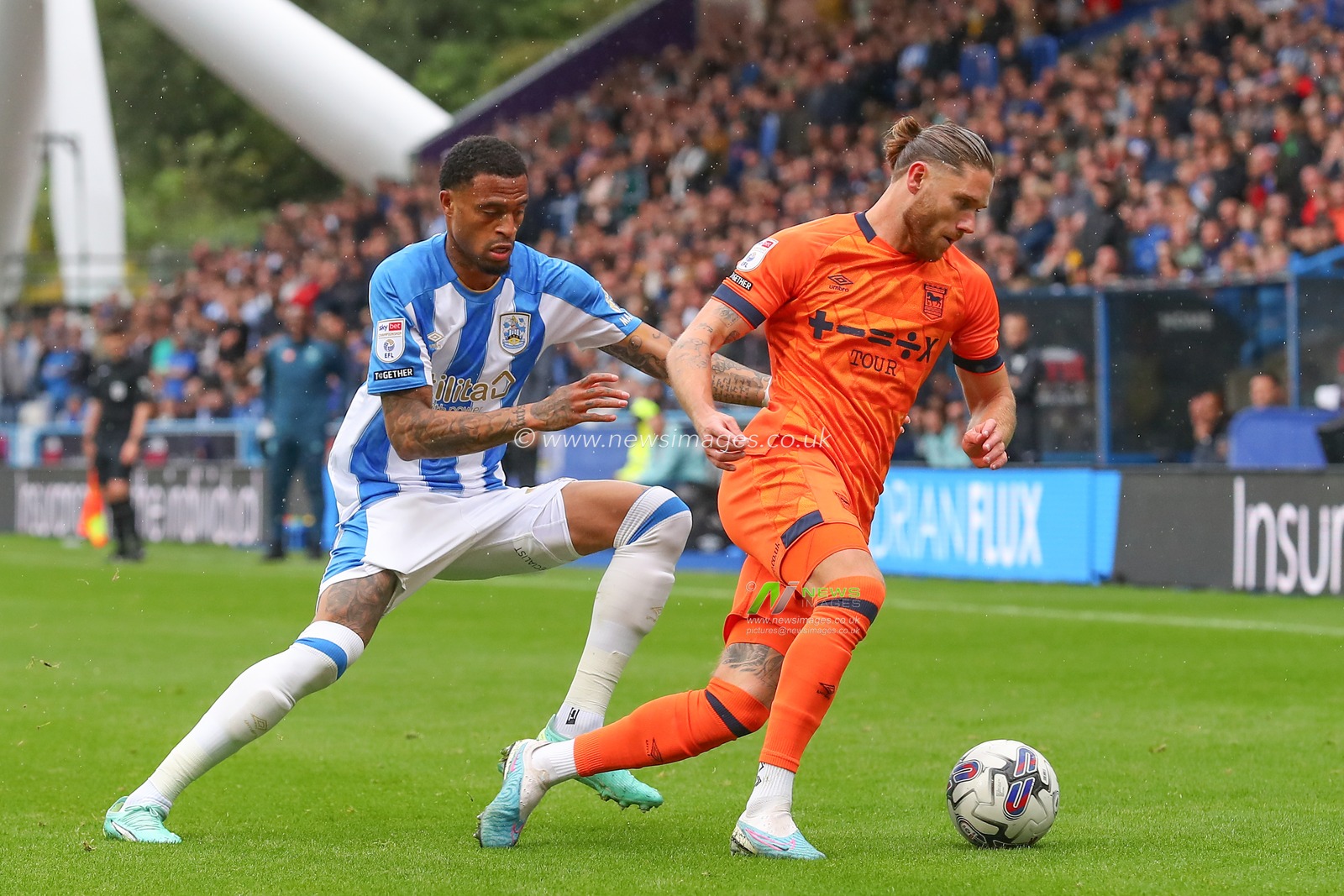 Delano Burgzorg #7 of Huddersfield Town pressures Wes Burns #7 of Ipswich Town during the Sky Bet Championship match Huddersfield Town vs Ipswich Town at John Smith's Stadium, Huddersfield, United Kingdom, 30th September 2023

(Photo by Gareth Evans/News Images)