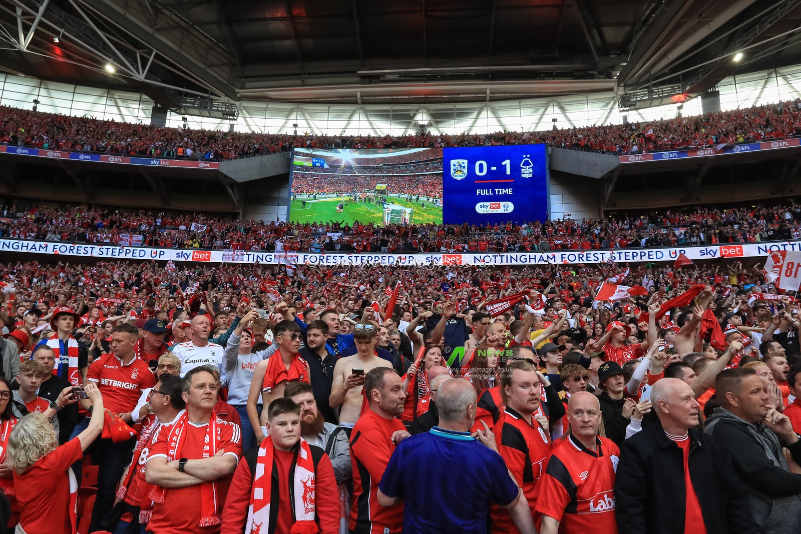 Nottingham Forest fans celebrate the 0-1 win as they are promoted to the Premier League
