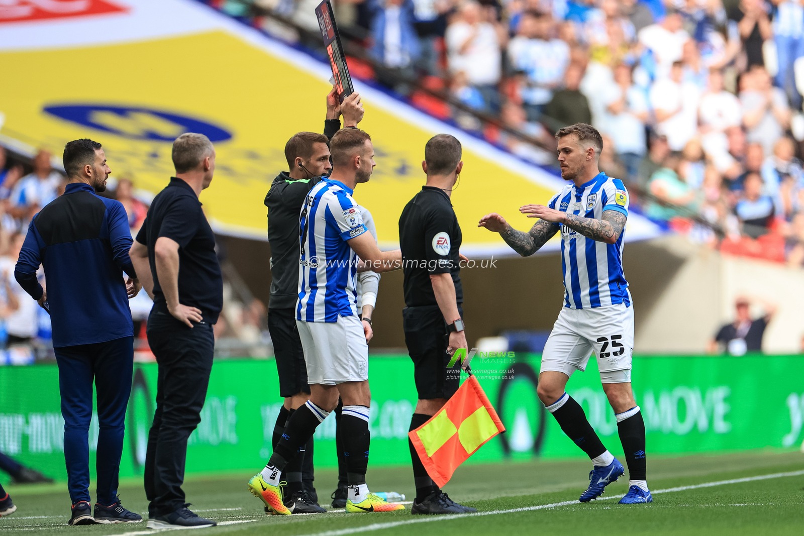 Jordan Rhodes #9 of Huddersfield Town comes on for Danny Ward #25 of Huddersfield Town
