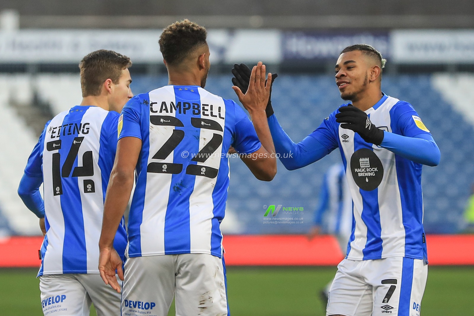 Fraizer Campbell #22 of Huddersfield Town celebrates his goal to make it 1-0 with Juninho Bacuna #7 of Huddersfield Town