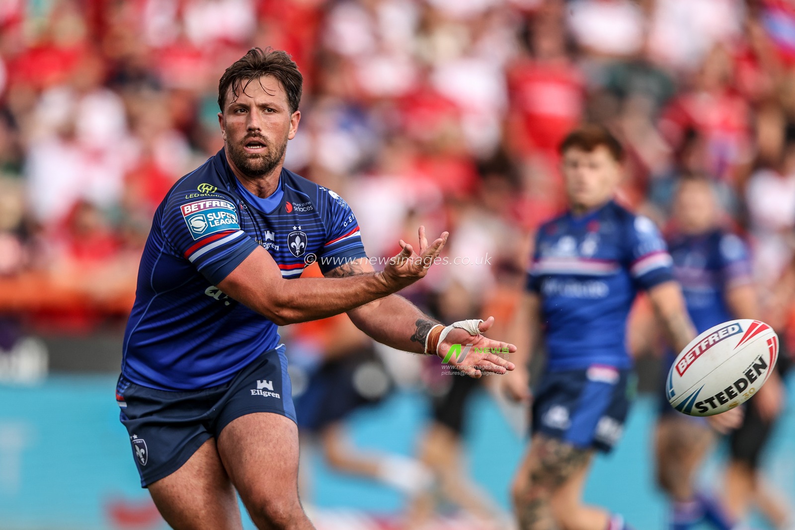 Tyson Smoothy of Wakefield Trinity passes the ball during the Betfred Super League round 18 match Hull KR vs Wakefield Trinity at Sewell Group Craven Park, Hull, United Kingdom on 11 July 2026

(Photo by Alfie Cosgrove/News Images)