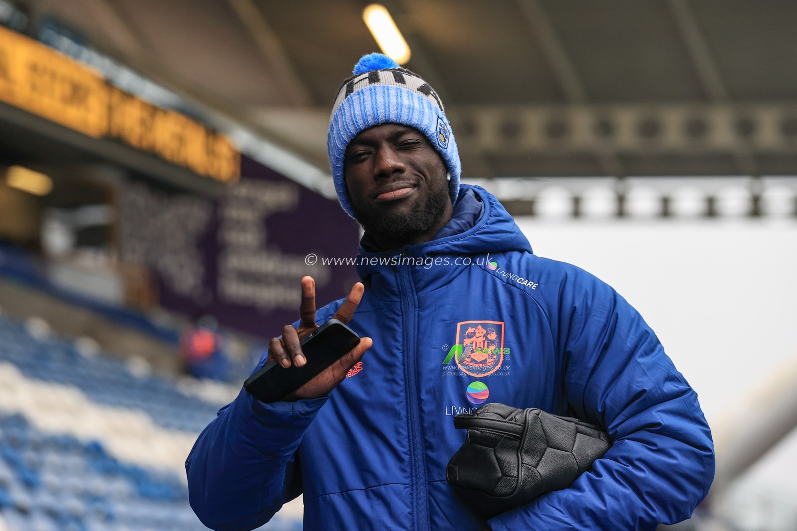 Naby Sarr #23 of Huddersfield Town arrives at the John Smiths Stadium