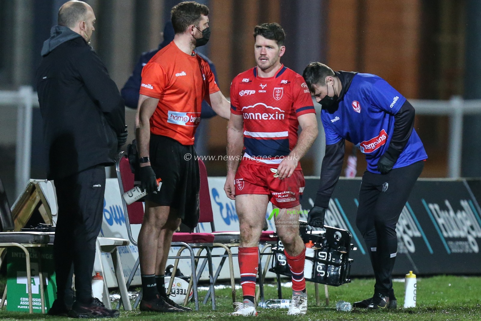Lachlan Coote #1 of Hull KR makes an early departure from the match shortly after half-time