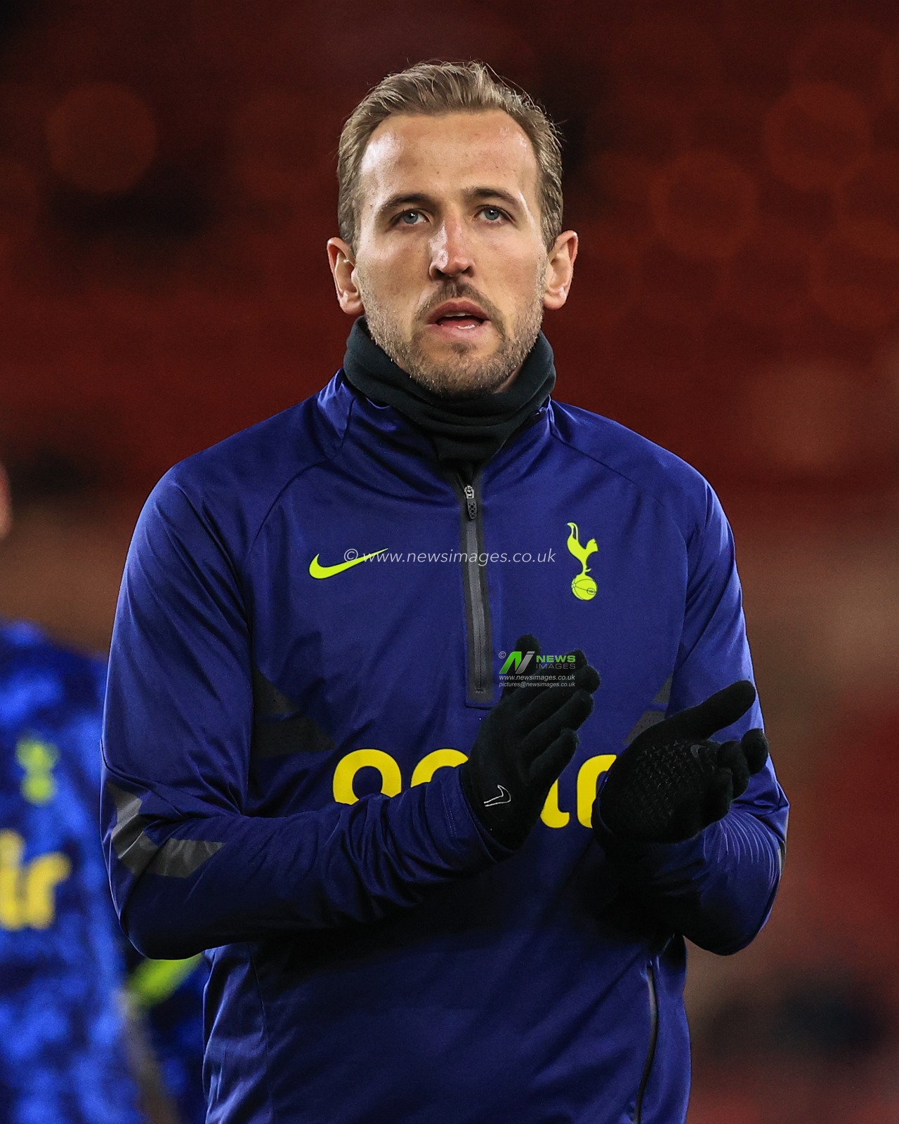 Harry Kane #10 of Tottenham Hotspur applauds the traveling fans during the pre-game warmup