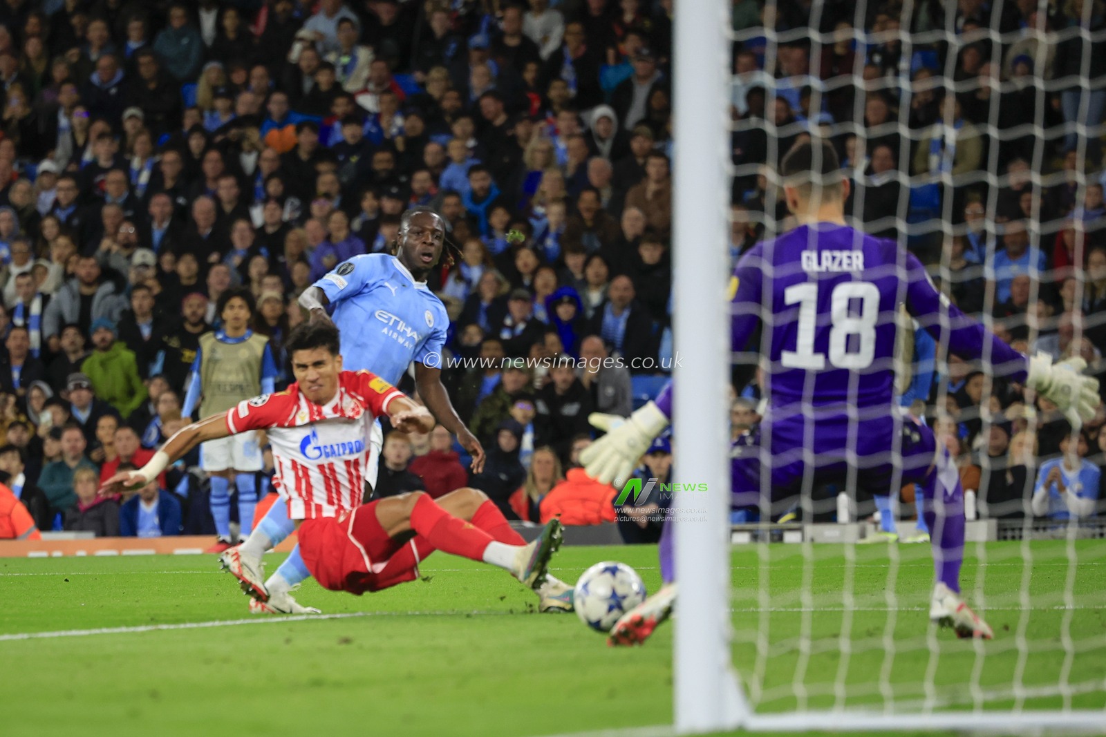 Jeremy Doku #11 of Manchester City has a shot on goal during the UEFA Champions League match Manchester City vs Red Star Belgrade at Etihad Stadium, Manchester, United Kingdom, 19th September 2023

(Photo by Conor Molloy/News Images)