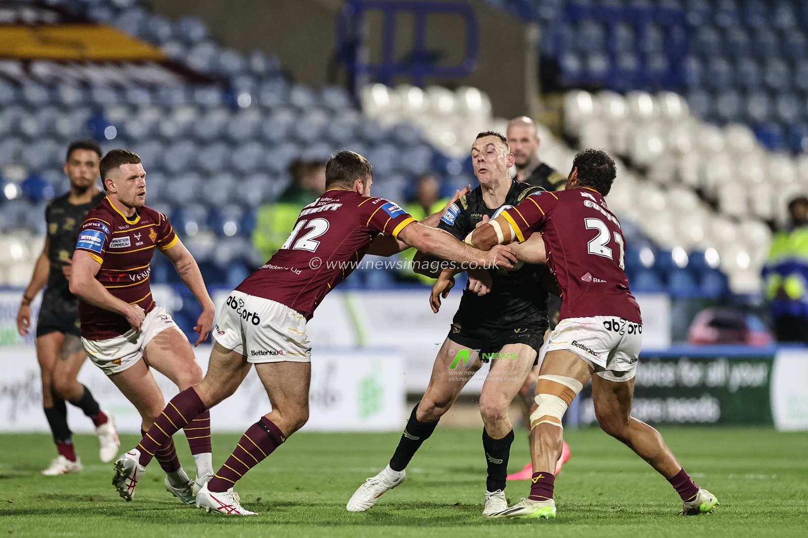 Frankie Halton of Leigh Leopards is tackled by Leroy Cudjoe of Huddersfield Giants during the Betfred Super League Round 12 match Huddersfield Giants vs Leigh Leopards at John Smith's Stadium, Huddersfield, United Kingdom, 24th May 2024

(Photo by Mark Cosgrove/News Images)