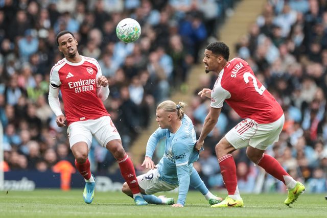Gabriel and William Saliba of Arsenal battle for the ball with Erling Haaland of Manchester City during the Premier League match Manchester City vs Arsenal at Etihad Stadium, Manchester, United Kingdom on 19 April 2026

(Photo by Mark Cosgrove/News Images)