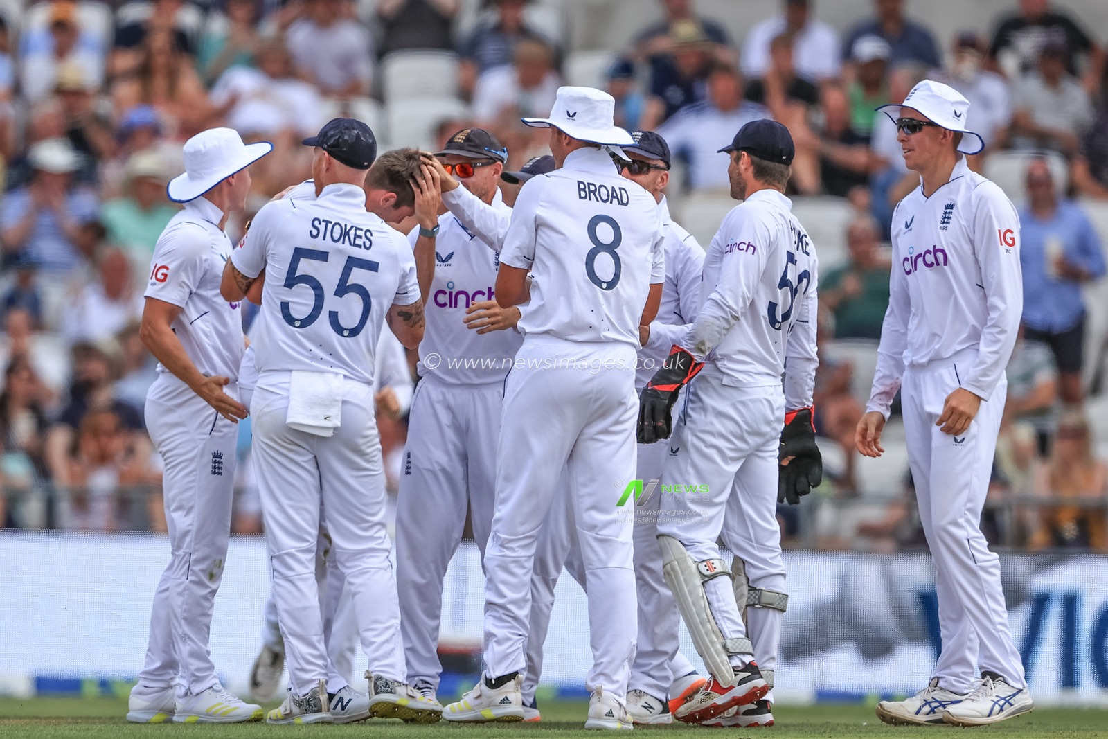 Jamie Overton of England celebrates bowling Devon Conway of New Zealand
