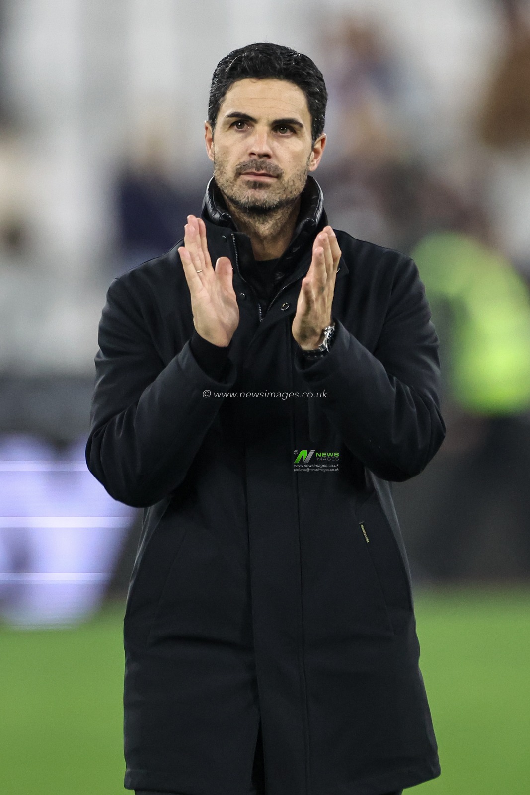 Mikel Arteta manager of Arsenal applauds the fans after the final whistle during the Premier League match West Ham United vs Arsenal at London Stadium, London, United Kingdom, 30th November 2024

(Photo by Mark Cosgrove/News Images)