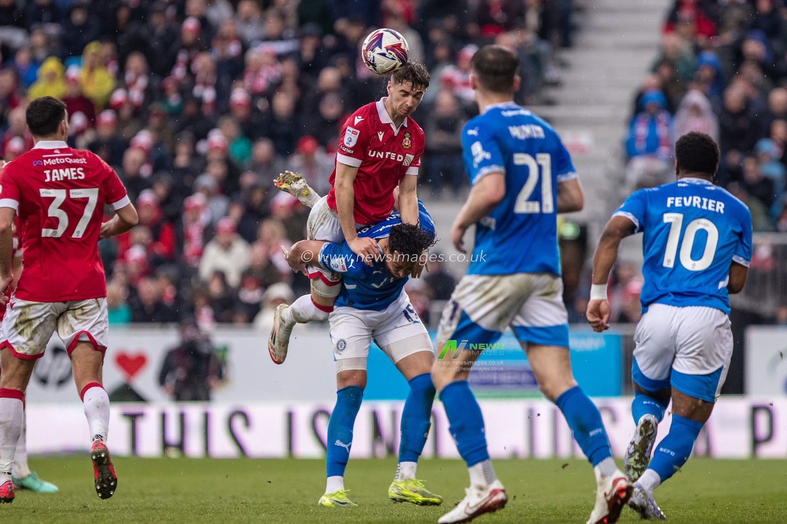 Wrexham's Lewis Brunt wins a header during the Sky Bet League 1 match Wrexham vs Stockport County at SToK Cae Ras, Wrexham, United Kingdom, 22nd March 2025

(Photo by Nik Mesney/News Images)
