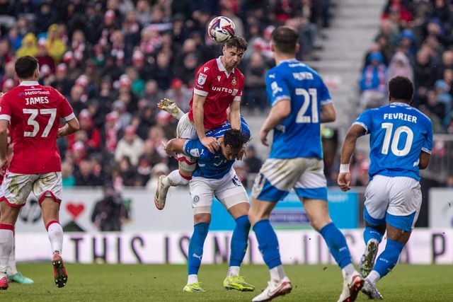 Wrexham's Lewis Brunt wins a header during the Sky Bet League 1 match Wrexham vs Stockport County at SToK Cae Ras, Wrexham, United Kingdom, 22nd March 2025

(Photo by Nik Mesney/News Images)