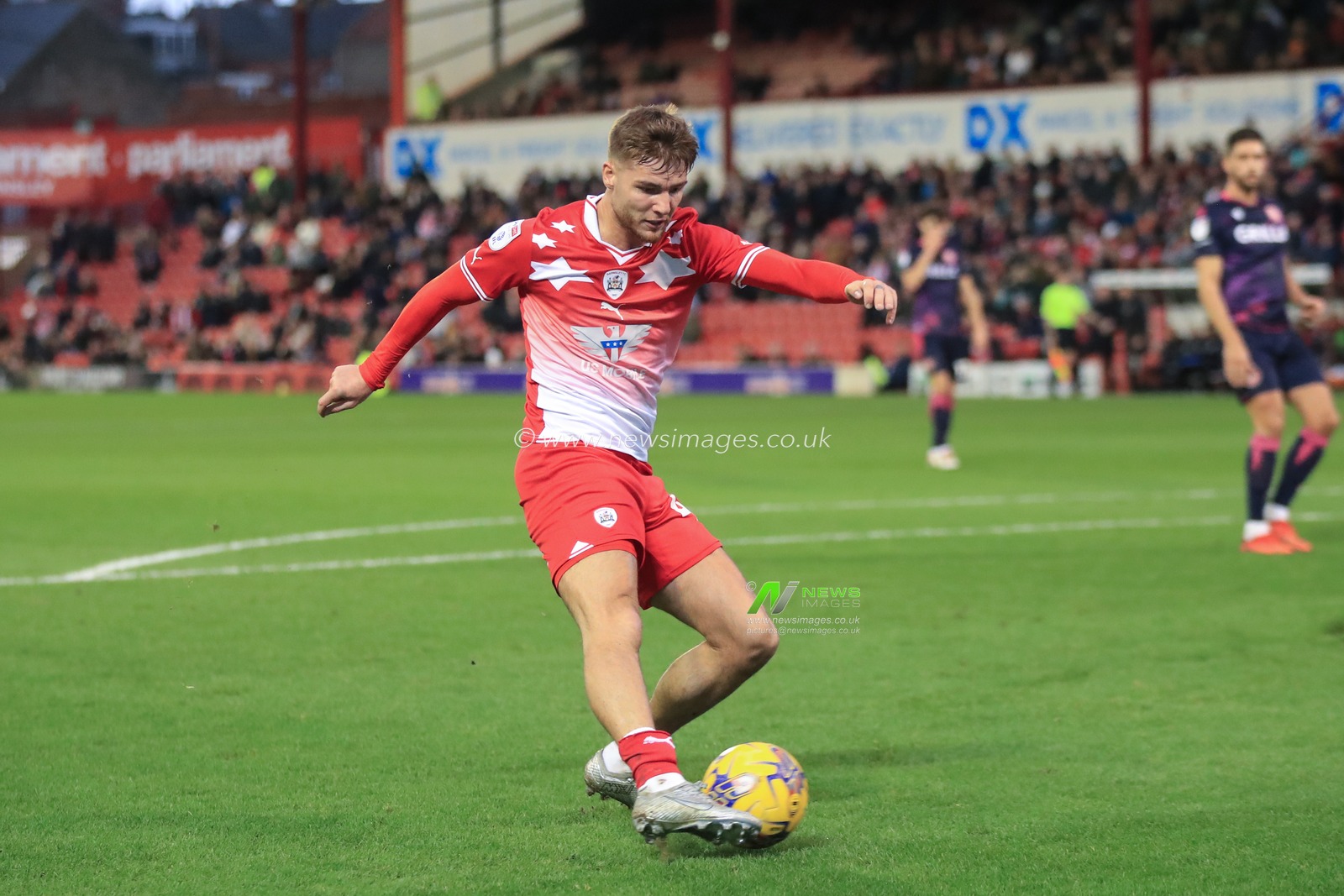 John Mcatee #45 of Barnsley takes a shot on goal however is ruled offside during the Sky Bet League 1 match Barnsley vs Stevenage at Oakwell, Barnsley, United Kingdom, 23rd December 2023

(Photo by Alfie Cosgrove/News Images)
