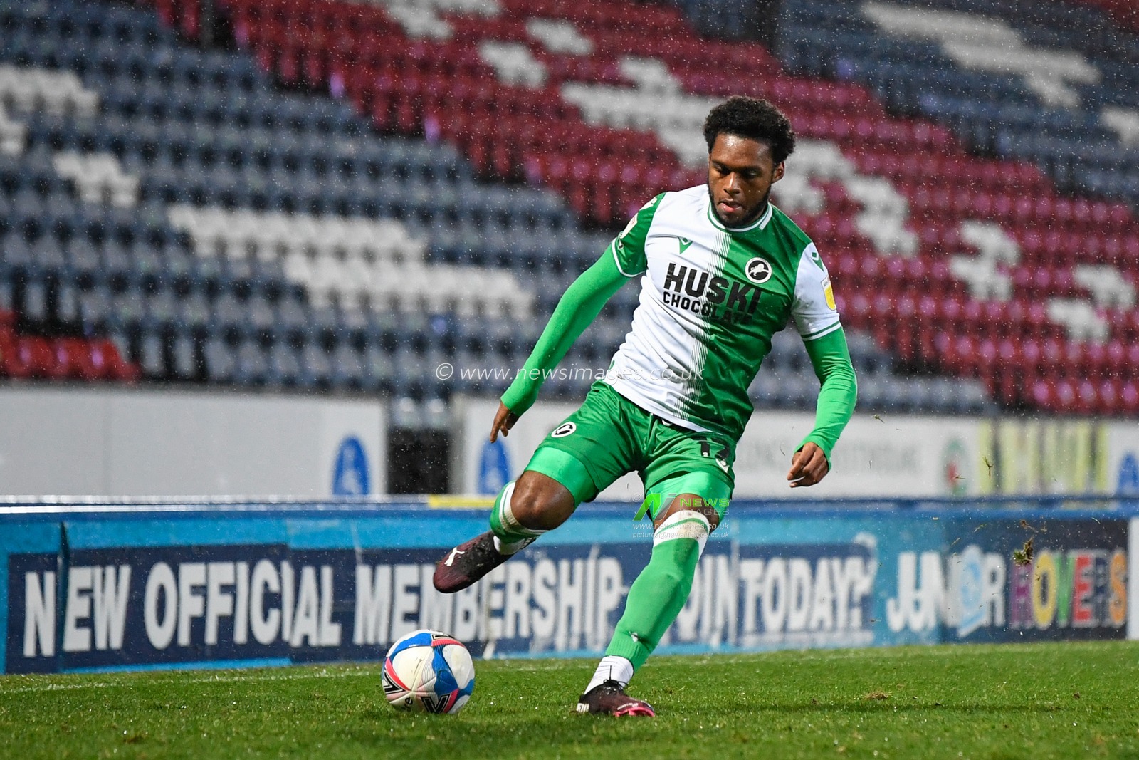 Mahlon Romeo #12 of Millwall crosses the ball
