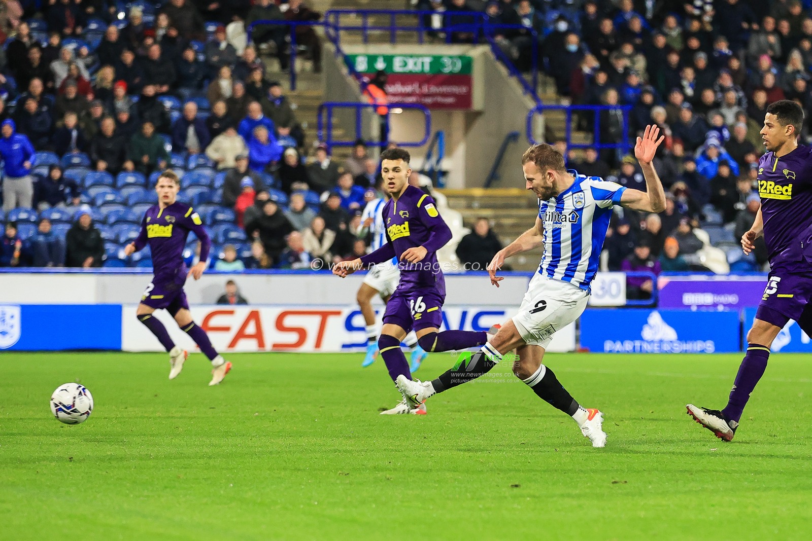 Jordan Rhodes #9 of Huddersfield Town scores to make it 2-0
