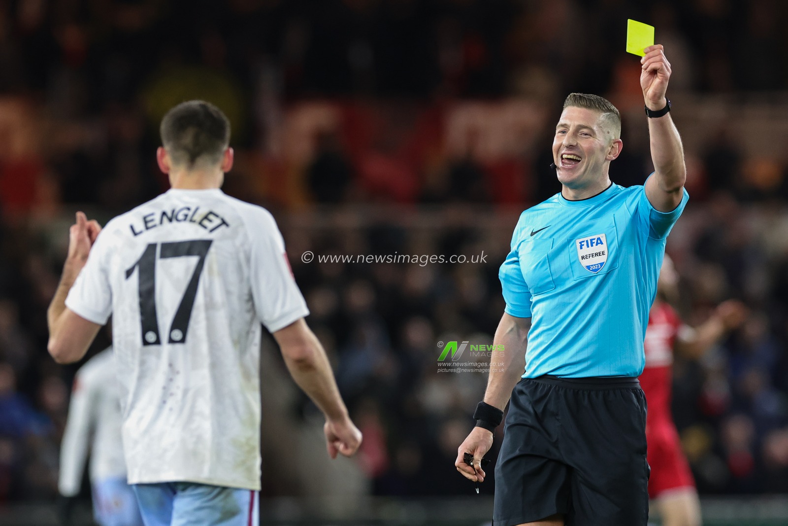 ClÃ©ment Lenglet of Aston Villa is shown a yellow card by referee Robert Jones during the Emirates FA Cup Third Round match Middlesbrough vs Aston Villa at Riverside Stadium, Middlesbrough, United Kingdom, 6th January 2024

(Photo by Mark Cosgrove/News Images)
