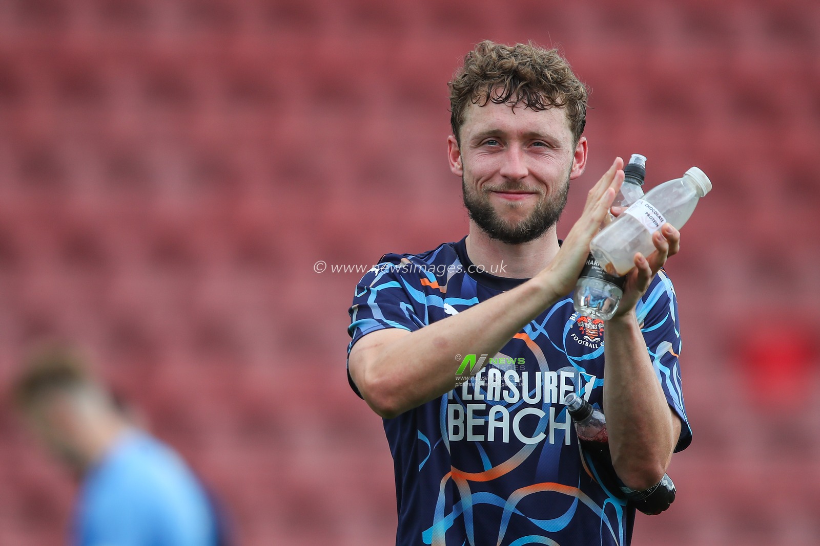 Matthew Pennington of Blackpool applauds the travelling fans after the Pre-season friendly match Crewe Alexandra vs Blackpool at Alexandra Stadium, Crewe, United Kingdom, 3rd August 2024

(Photo by Gareth Evans/News Images)